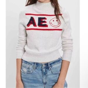 NWT American Eagle Womens Smiley Graphic Sweater Large Mock Neck Cozy Light Gray